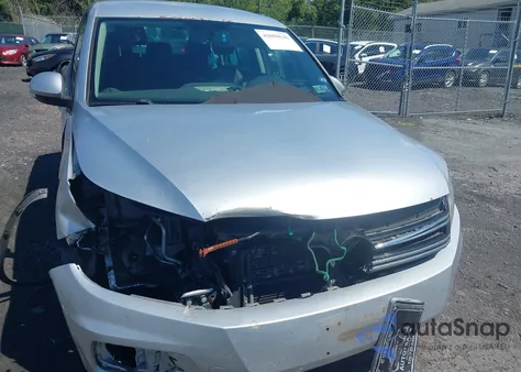 2012 Volkswagen Tiguan Le z USA, uszkodzony, nr VIN WVGAV7AX0CW560866